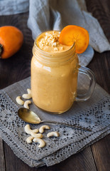 Smoothie with persimmon and cashew nuts