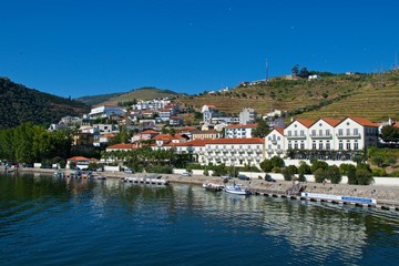 Fototapeta na wymiar Buildings along Douro River in Douro Valley in Pinhao, Portugal