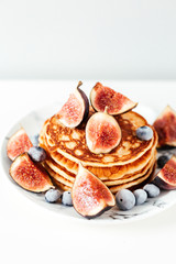 Breakfast pancakes with figs and coffee