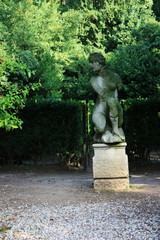 Fototapeta premium Ancient statue in an italian park