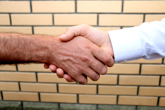 shaking hands with men