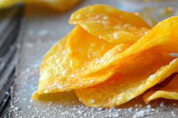 potato chips with salt.selective focus.
