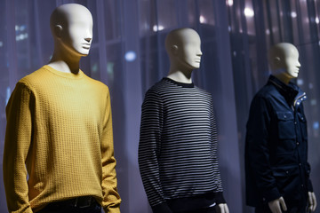 Men urban clothing on mannequins in a store in Paris, 2018.