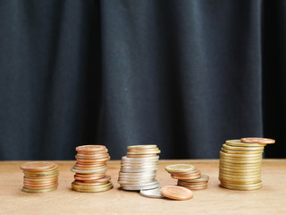 stacks of coins and stock chart,concept save money
