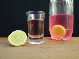 cup of water with lemon and mint