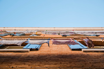 Roof of a house. Colorful clothes