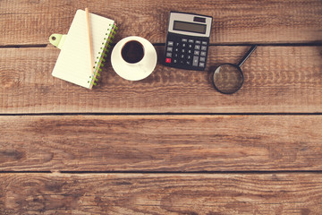Fototapeta premium notepad and coffee with calculator