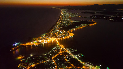 Aerial Night in a coastal city