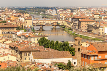 Fototapeta na wymiar Panoramic view to Florence. Ponte Vecchio bridge in Florence over the Arno river