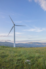 Wind blades on sweet hills