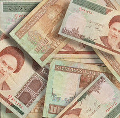 Iranian money with the image of Ruhollah Khomeini and a place for copy space.