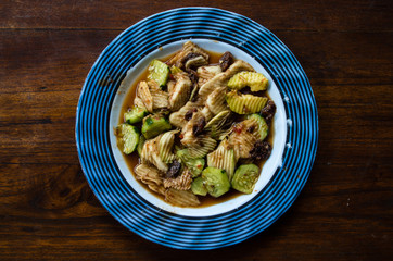 RUJAK - traditional fruit and vegetable salad dish in Indonesia, centered from top.