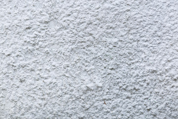 rough texture of a plaster gray wall.