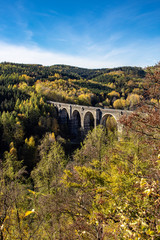Colorful autumn forest with the Hetzdorfer Viaduct in the Ore Mountains,Saxony,Germany