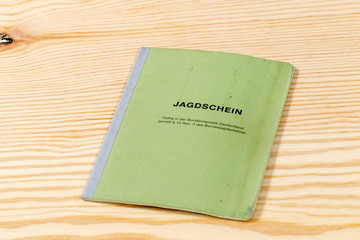 German hunting license with the german lettering "Jagdschein" means hunting license