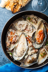 Mussels with Blue Cheese Sauce and Garlic Baguette.
