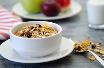 Breakfast with dried fruits and milk.