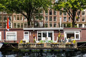 Houseboat in Amsterdam at Canal River