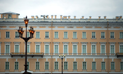 Fototapeta na wymiar Vintage street lamps on the background of an old house in St. Petersburg