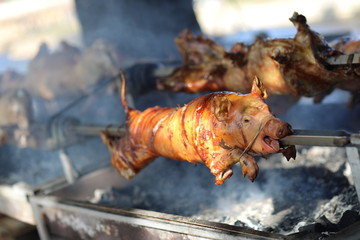 roasted pig on the stick
