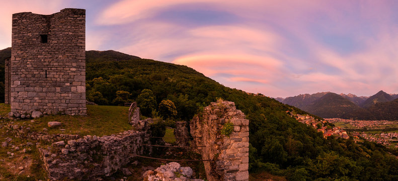 Panoramic of Castello di Domofole at sunset, Costiera dei Cech, Mello, Sondrio province, Lower Valtellina, Lombardy