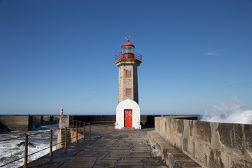 Fototapeta na wymiar lighthouse in porto