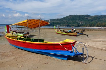 Colourful fishing boats on beach