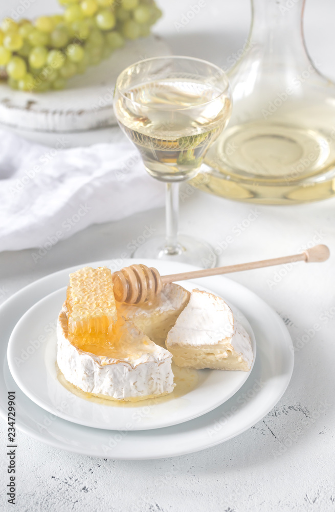 Wall mural camembert with honey, grapes and white wine