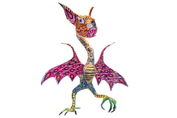 Monster called Alebrije in Mexico with clipping path. Colorful bat or bird figure made as a craft