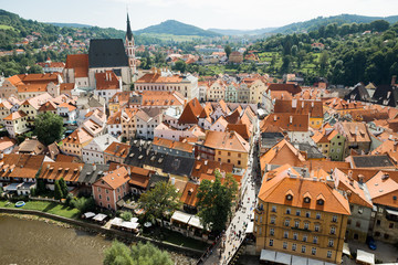 Fototapeta na wymiar The top view of the river Ltava, as well as the beautiful red roofs of the Czech city of Cesky Krumlov