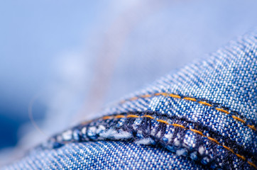 Blue jeans material fabric texture fashion seam fittings macro blur background
