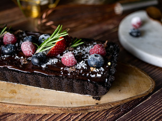 Rectangular Tart Chocolate cheesecake with fresh berries. delicious dessert for celebrate.