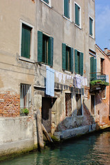 Fototapeta na wymiar old ruinous houses homes clinker brick work laundry washing venice italy europe 