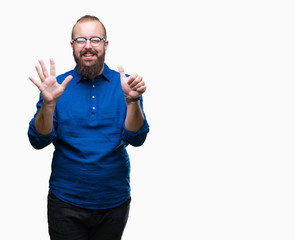 Naklejka premium Young caucasian hipster man wearing glasses over isolated background showing and pointing up with fingers number six while smiling confident and happy.