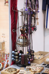 Beautiful hanger for jewelry in the form of a mannequin female silhouette in a dress