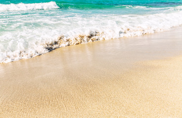 Sandy coast, turquoise sea, wave
