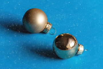Christmas balls on the snow background