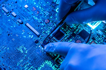 scientist research and create micro electronic technology chip in the laboratory f