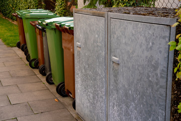 different coloured garbage cans