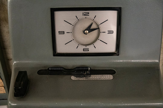 a very old stamp clock
