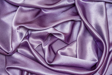 Beautiful smooth elegant wavy violet purple satin silk luxury cloth fabric texture, abstract background design. Card or banner.