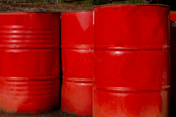 colored metal barrels. Blue oil drums containing fuel for transportation