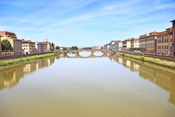 landscape of Florence or Firenze city Italy with impressive water reflections of the buildings on Arno river