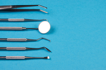 Professional Dentist tools in dental office close-up, top view
