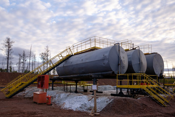 Oil industry. Oil Storage Tanks for petroleum products at the refinery. Septic tanks  will bring...