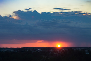 Obraz premium evening sunset, blue sky in the clouds. calm mood