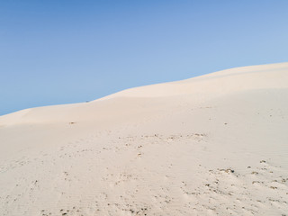 Amazing white dune, sand texture , blue sky pastel color, Brazil, Parnaíba.	