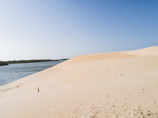 Fototapeta na wymiar Beautiful dune of Parnaíba, Brazil, with drone.