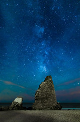 Milky way over the ruins of an old tower