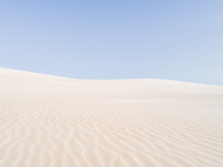 Amazing white dune, sand texture , blue sky pastel color, Brazil, Parnaíba.	